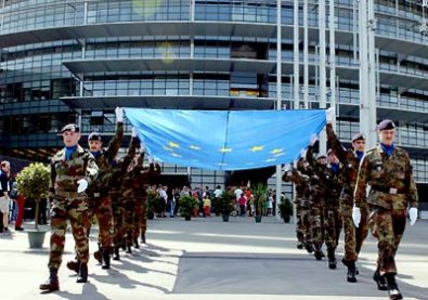 EAS troops about to raise the EU's flag